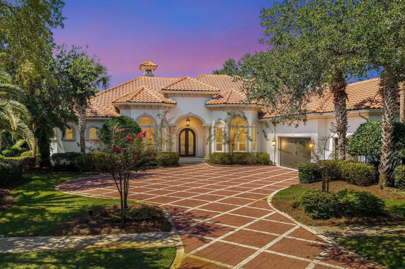 Front of the home at twilight at 3508 Burnt Pine Lane