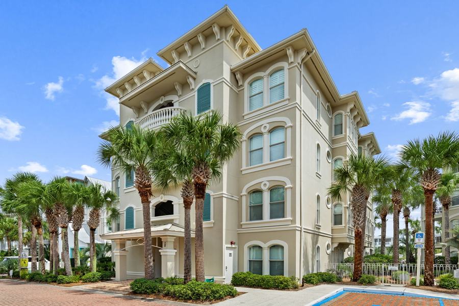 Villas at Seacrest Beach building at 36 Seacrest Beach Boulevard, framed by palms